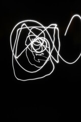 Abstract art light show with different colours long exposure photo graphic design dark backround