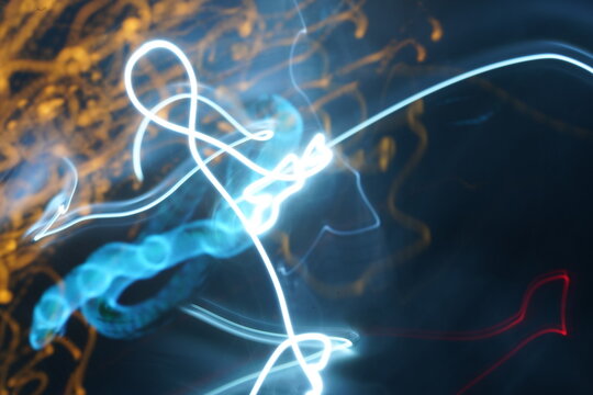 Abstract art light show with different colours long exposure photo graphic design dark backround