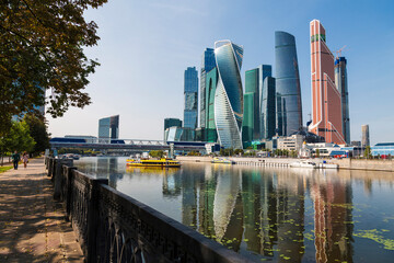 View of the Moscow International Business Center from the quay of Taras Shevchenko on a sunny summer day, Moscow, Russia - obrazy, fototapety, plakaty
