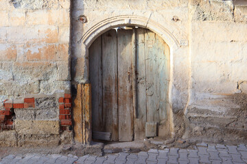 Fototapeta na wymiar Old wooden white door in Avanos, Cappadocia, Turkey