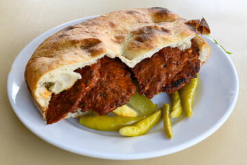 Meatball between bread (Turkish name : ekmek arasi kofte ) Izgara kofte. Manisa, Akcaabat, Akhisar  kofte