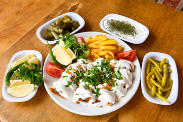 Delicious turkish kebab tantuni .Mersin et tavuk ekmek arasi tantuni,  yogurtlu tantuni durum.