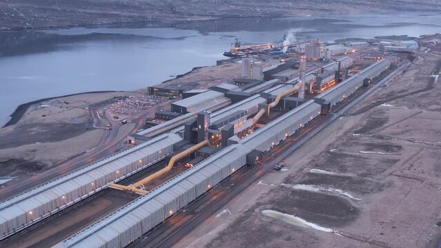 Early morning at Alcoa Fjarda&aacute;l aluminium factory in Iceland, aerial