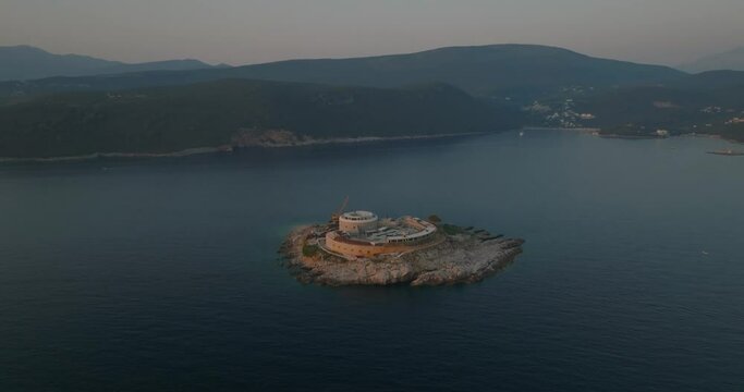 orbit shot of mamula island during susnet