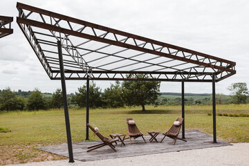 Rest area for guests. A place to relax with wooden chairs and tables