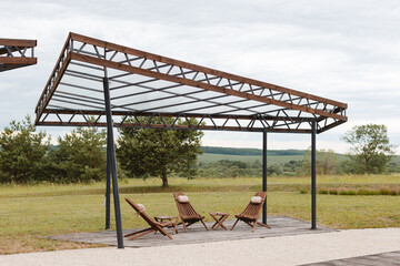 Rest area for guests. A place to relax with wooden chairs and tables