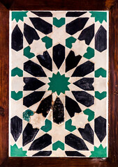 Fragment of glazed Andalusian ceramic tiled wall
