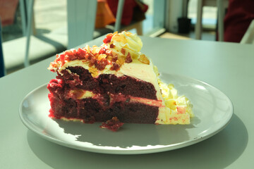 Selective focus of red velvet cake on the plate.