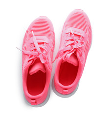 Pair of stylish pink sneakers on white background, top view