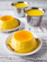 Spanish sweet flan on a white table