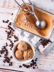 Coffee ice cream on rustic white table
