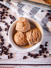 Coffee ice cream on rustic white table