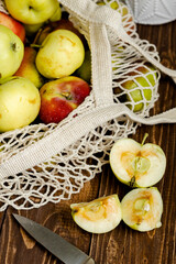 Apples. Apples in the bag on the wooden table