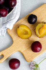 Plums on the white background. Summer fruits