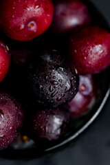 plums on a dark background