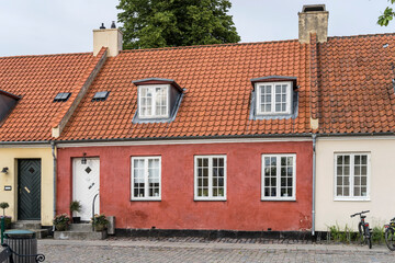 traditional terraced red house with dormers on roof, Dragor, Denmark