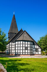 Fototapeta na wymiar The wooden church of Holy Trinity, Polnica, Pomeranian Voivodeship, Poland
