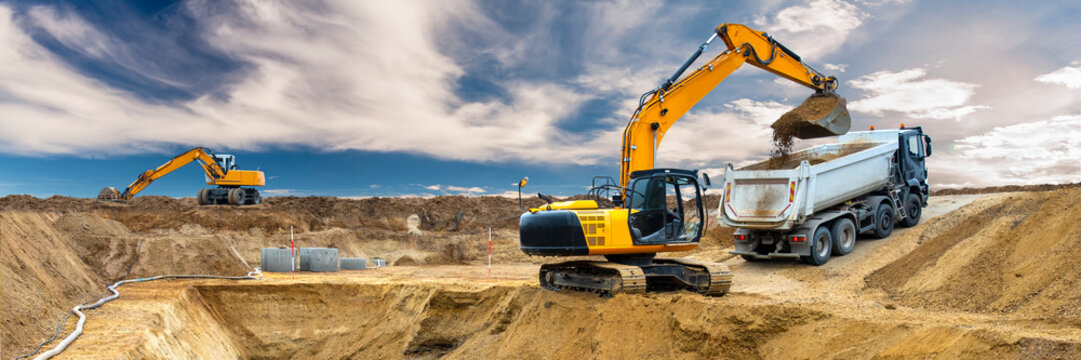 excavator is digging on construction site