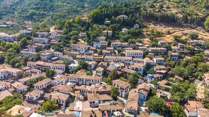 Fototapeta na wymiar View of the old Sirince houses on the mountain slope. sirince is an old village of Selcuk, which is a district centre of Izmir. It is famous with its old Greek architecture and local wine. High