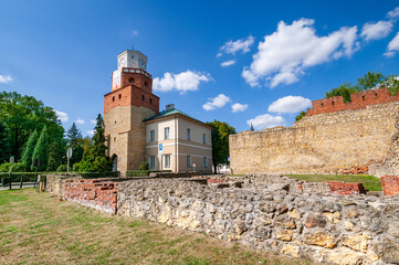 Fototapeta na wymiar Town hall with the Kraków Gate and Fortified walls, Wieluń, Lodz Voivodeship, Poland