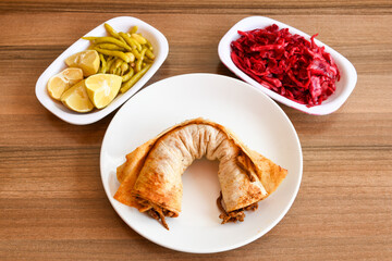 Delicious turkish kebab tantuni .Mersin et tavuk ekmek arasi tantuni,  yogurtlu tantuni durum.