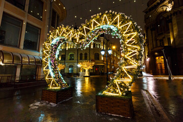 Street decorations with Christmas lights and Illuminated trees.