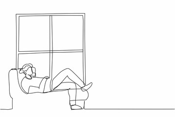 Single one line drawing young man lying on windowsill at home. Male resting in room near window. Spending time at home, relaxing after work, reading. Continuous line graphic design vector illustration