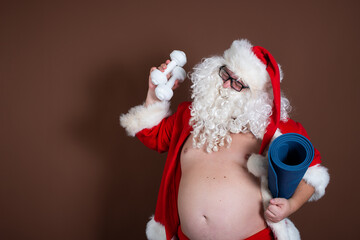 Funny Santa Claus goes in for sports.	