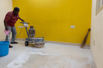 Bangalore, India 12th July 2022: Mosaic Tiles Polishing and Cleaning to remove dust and texture...