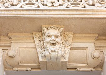  Mascaron on building facad