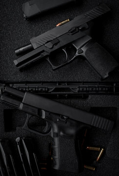 Two 9mm pistols hold slides on a wooden table.