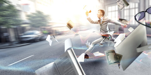 Portrait of energetic businessman jumping in open air