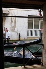 Fototapeta na wymiar Gondoles in Venice Canals Italy Beatiful old architecture reflections high resolution 