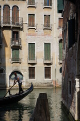 Gondolers in Venice Canals Italy Beautiful old architecture reflections high resolution 