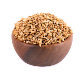 Utsho suneli seeds in wooden bowl, isolated on white background. Trigonella caerulea or blue fenugreek.