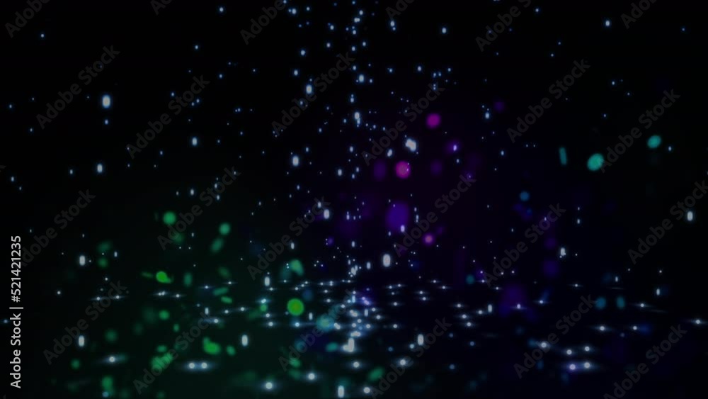 Aufkleber animation of colorful glitter particles and lens flares moving in seamless loop on black background