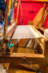 Chefchaouen, Morocco - 18 January 2022 : Traditional Moroccan Berber loom in a coton shop
