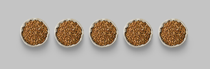 Pattern buckwheat bags are isolated on a gray background. Top view