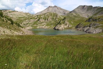 Lake of the Encombrette pastoral hut on a July afternoon (Parc du Mercantour,...