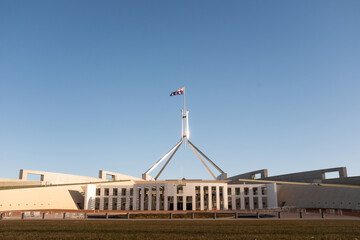 the new Australian Parliament House in Canberra Australia at sunset