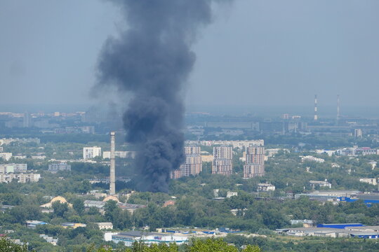Black smoke from the fire. Explosion and fire at the plant. High quality 4k footage