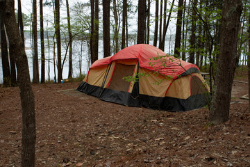 Rainy day tent at a lake