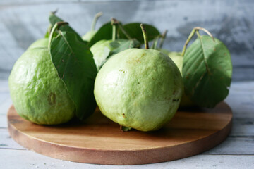 close up of slice of guava on table 