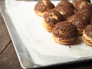 Choux au craquelin on baking tray