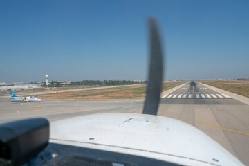 Fototapeta na wymiar Light aircraft landing about to land.