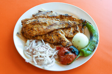 Chicken wings barbeque in a dish with BBQ grill sauce . Izgara tavuk kelebek sis kanat. Tavuk sis, gogus.