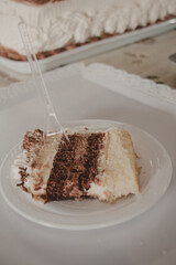 close up slice of birthday cake on plate