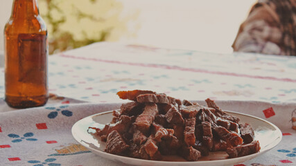 closeup sliced barbecue meat on plate