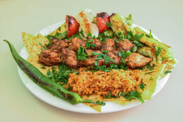 Chicken wings barbeque in a dish with BBQ grill sauce . Izgara tavuk kelebek sis kanat. Tavuk sis, gogus.