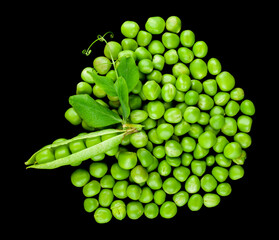 Green peas isolated on black background.